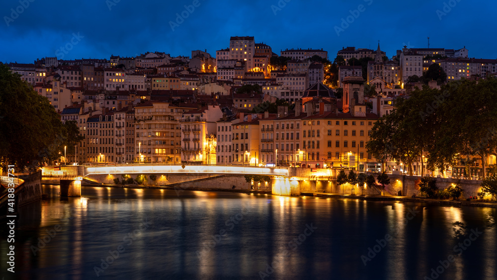 view of the river rhone and city of Lyon at twilight