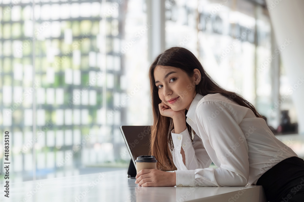 Portrait Of Attractive Asian Business working woman in office. Portrait Of Attractive Asian Business working woman in office.