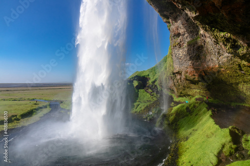 Beautiful Seljalandsfoss waterfall in Iceland, icelandic summer nature and river landscape 