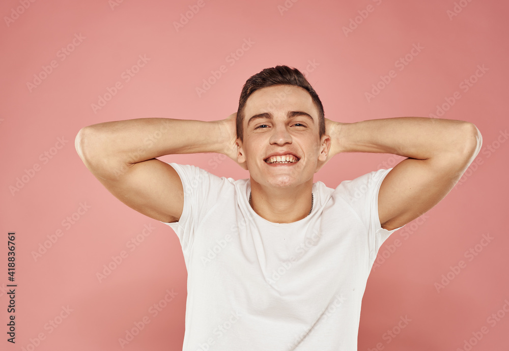 emotional man in white t-shirt gesturing with hands cropped view pink background emotional man in white t-shirt gesturing with hands cropped view pink background