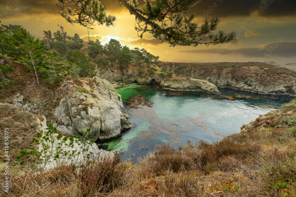 China Cove, Beach in Point Lobos State Natural Reserve, with rock and geological formations along the rugged Big Sur coastline, near Carmel and Monterey, CA. on the California Central Coast. China Cove, Beach in Point Lobos State Natural Reserve, with rock and geological formations along the rugged Big Sur coastline, near Carmel and Monterey, CA. on the California Central Coast.