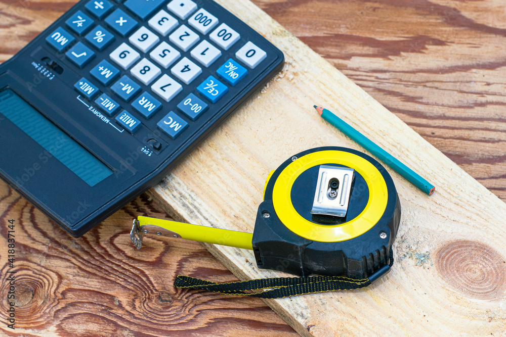 construction metertape measure calculator for calculations pencil and