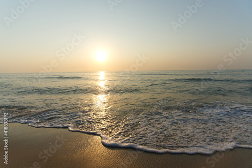 waves on the beach at sunrise Cha-am Phetchaburi near Bangkok, Thailand