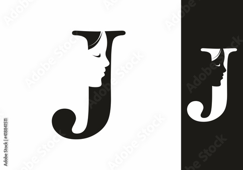 Black and white J initial letter with silhouette of women face