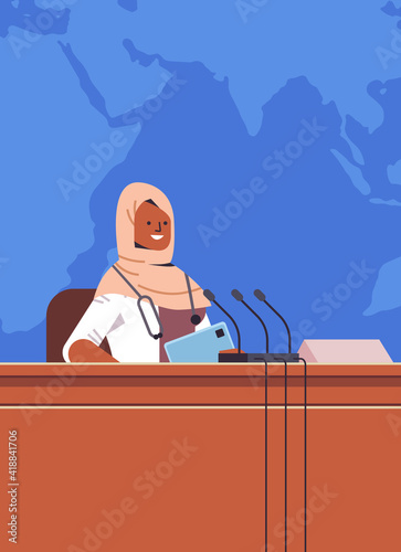 black muslim female doctor giving speech at tribune with microphone medical conference medicine healthcare concept portrait vertical vector illustration