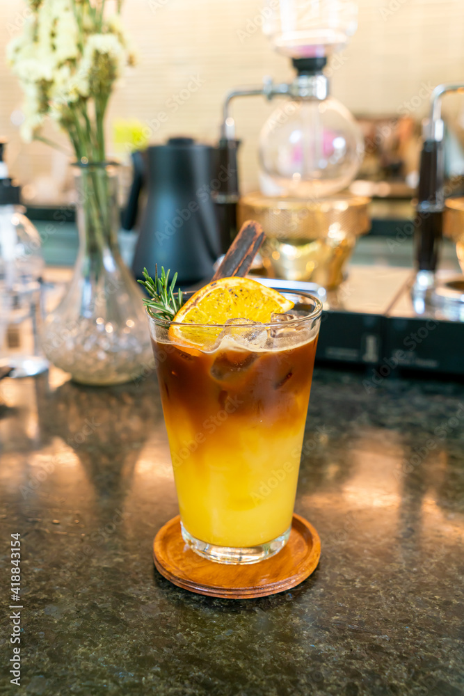 orange and lemon juice soda topped with black coffee orange and lemon juice soda topped with black coffee