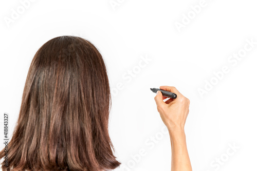 Woman writing on white background with black marker pen