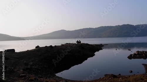 Beautiful Panoramic View Of The Chapoli Dam Reservoir In South Goa India - panning wide shot photo