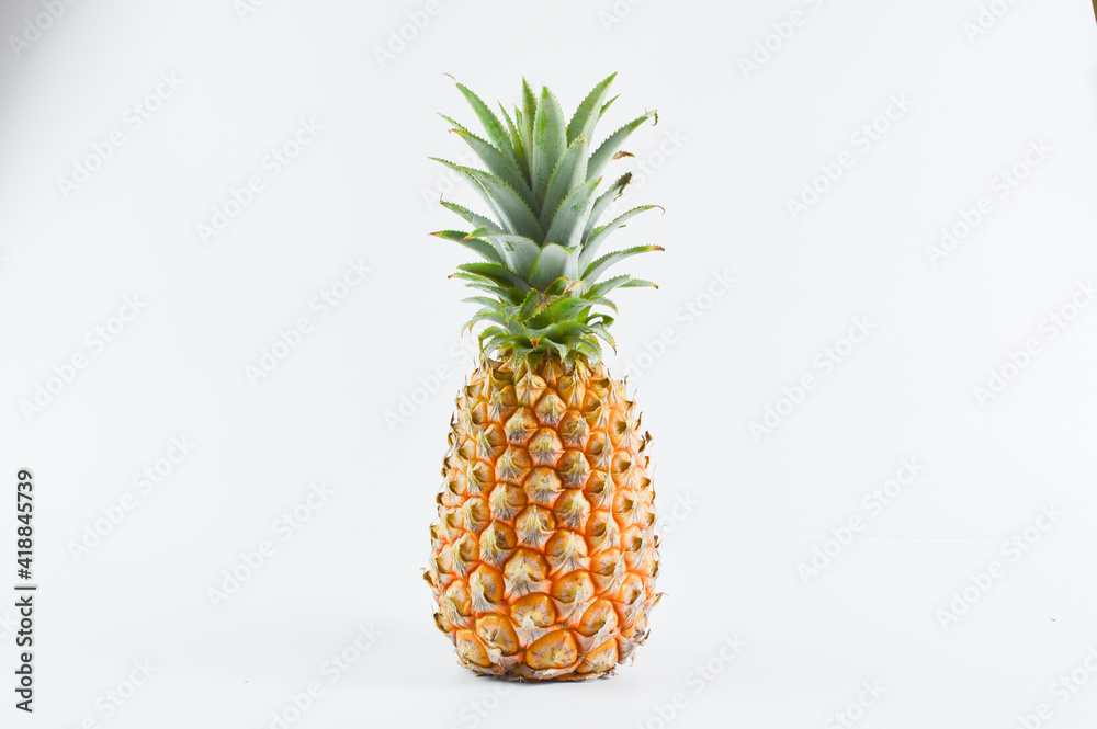 Pineapple over white background. Tropical fruit. Pineapple over white background. Tropical fruit.