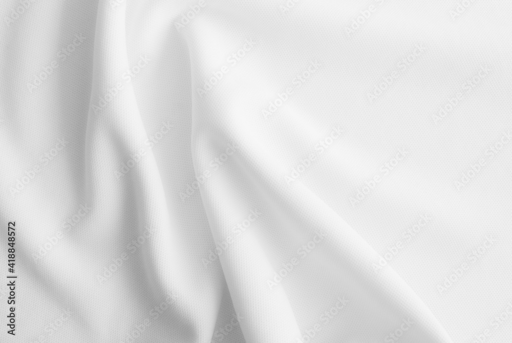 White wavy clothes background. fabric texture