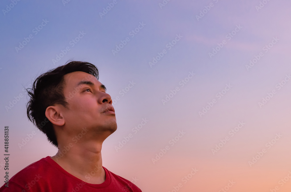 Asian man looking up to sky. Emotion face expression. Asian man looking up to sky. Emotion face expression.