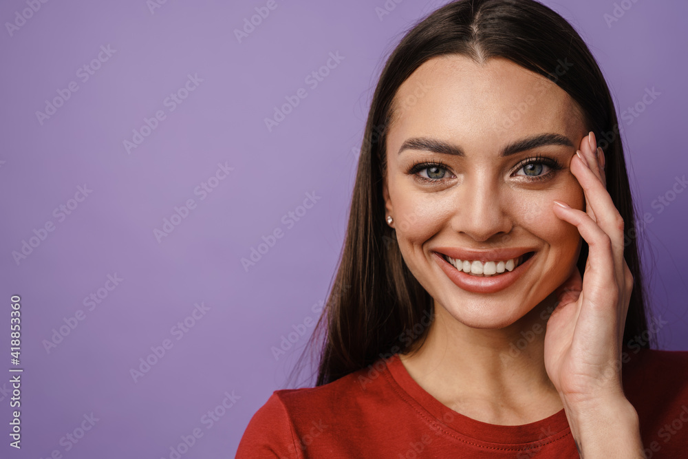 Happy beautiful brunette girl smiling and looking at camera Happy beautiful brunette girl smiling and looking at camera