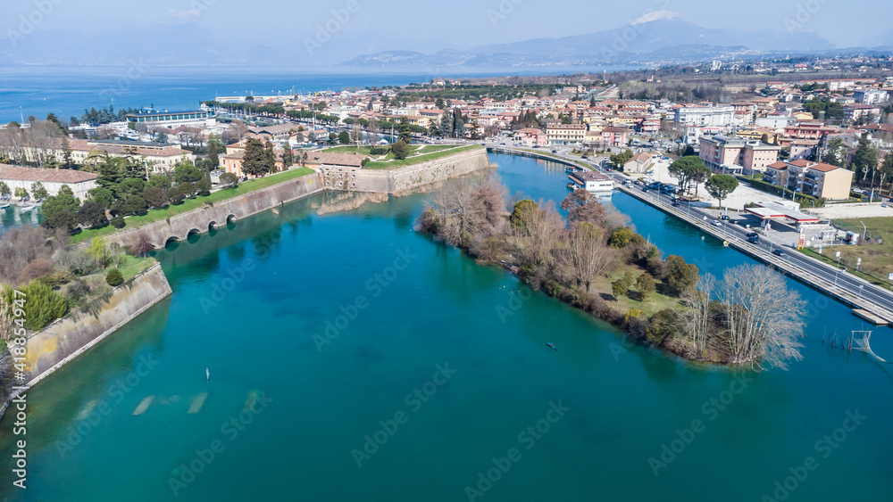 Aerial view of the ancient fortified town of Peschiera dal Garda, protected by mighty Renaissance walls and canals that surround it.