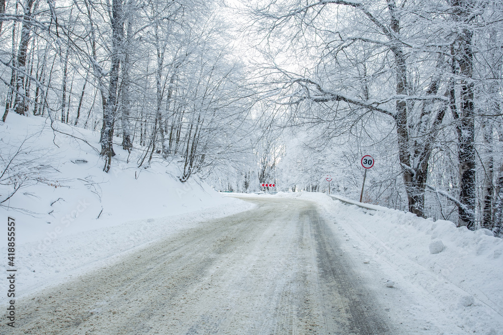 Road in Sabaduri forest with covered snow. Winter time Road in Sabaduri forest with covered snow. Winter time