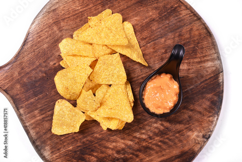 Tortillas with cheese snacks on wooden background