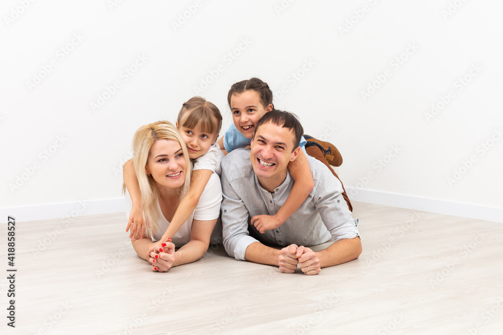 Portrait of a happy family smiling at home Portrait of a happy family smiling at home