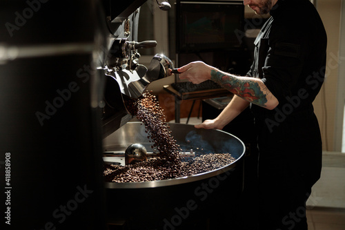 Slika na platnu confident coffee roaster man is checking preparation process