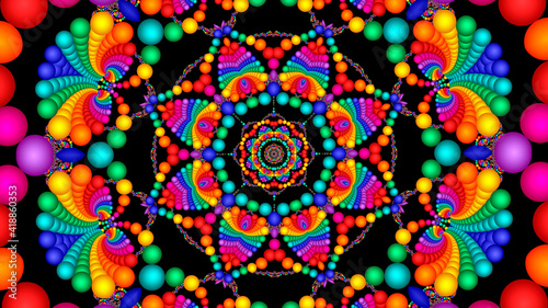 abstract background created from multi-colored bright beads creating an abstract flower in the center of the composition on a dark background