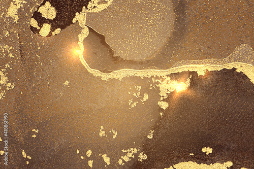Brown and gold abstract background. Alcohol ink marble texture with glitter. Template for banner, poster design. Fluid art painting