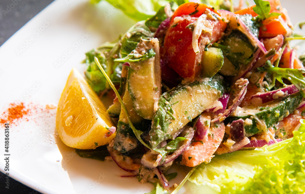 Smoked salmon salad, with mixed greens, avocado,grapefruit, radish and green pea. Delicious healthy eating.