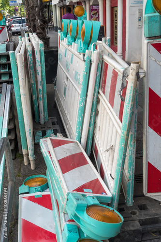 Frankfurt am Main, Germany - June 27, 2020: Parts of a red and white barrier of a construction site
