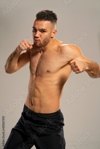UFC fighter on a gray background