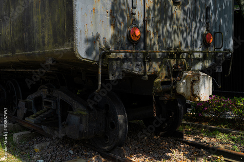 Close up back view of old rustic train park as long time ago in public park in Japan.Demonstrate train parking on railway in vintage retro style from old century.