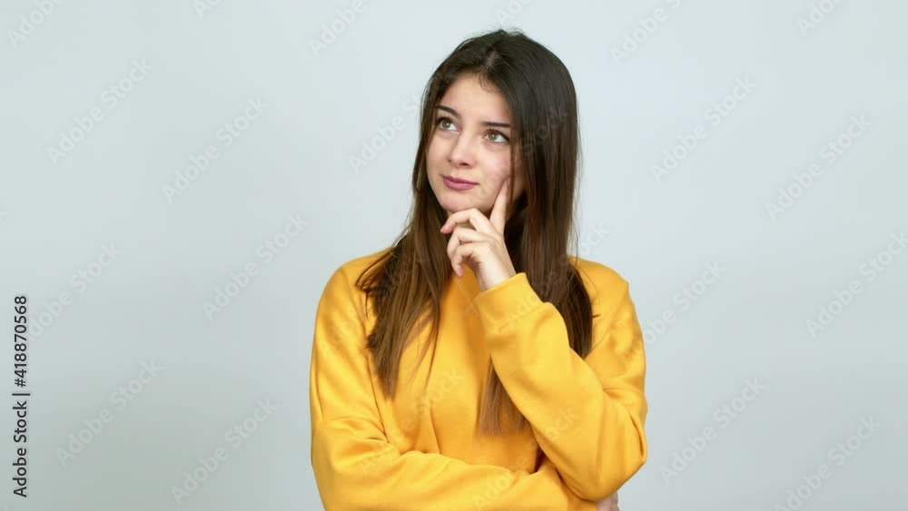 Young caucasian woman having doubts and questioning an idea over isolated background Young caucasian woman having doubts and questioning an idea over isolated background