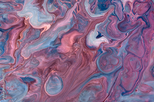 Abstract fluid art background dark purple and blue colors. Liquid marble.