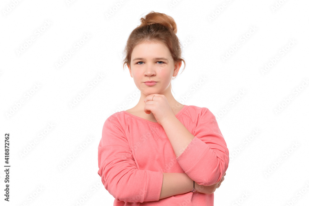 close up young girl looking confident at the camera with smile with crossed arms and hand raised on chin close up young girl looking confident at the camera with smile with crossed arms and hand raised on chin