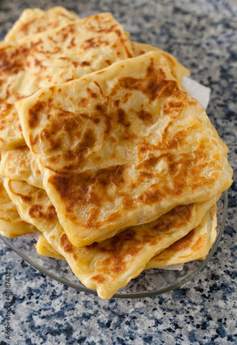 Rghayf or Msemmen are a squared crunchy pancakes traditional from Morocco and North Africa. 