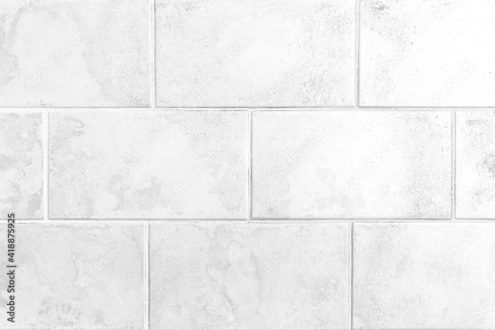 Fototapeta premium Vintage white granite building tile wall texture and background seamless