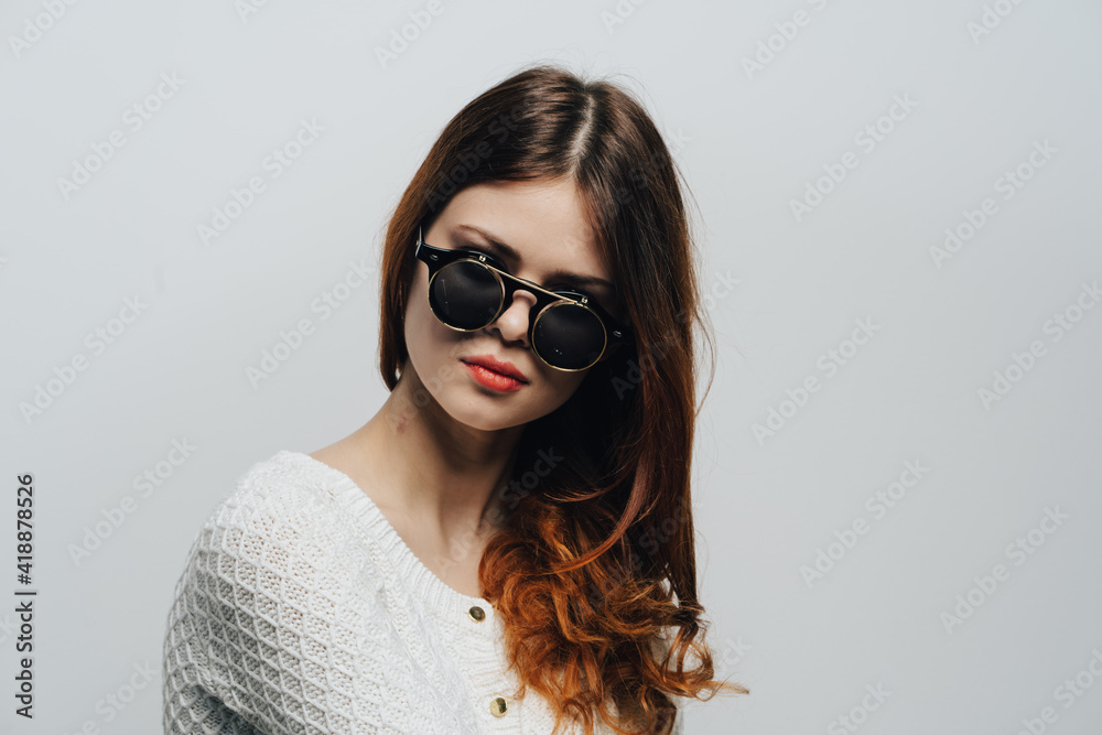 attractive woman wearing sunglasses loose hair studio fashion close-up attractive woman wearing sunglasses loose hair studio fashion close-up