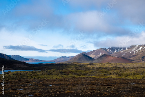 View over the Berserkerjahraun lava field with the mountains Kothraunsúla and Seljafell (right) and the lake Selvallavatn at the Selvellir valley on the Snæfellsnes peninsula in western Iceland.