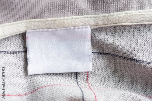 laundry care clothing label on fabric texture