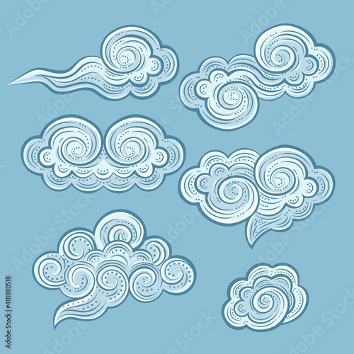 Hand-drawn decorative blue clouds set