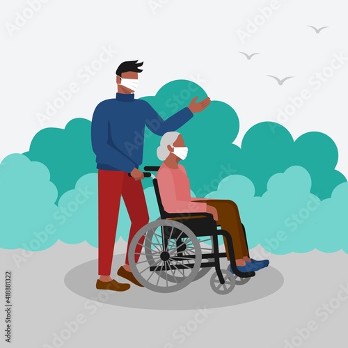 Young man walks in park with elderly woman in wheelchair