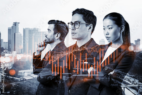 Photography Group of business colleagues in suits as a part of multinational corporate team working on forecasting trading corporate strategy at fund