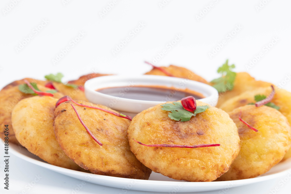 Decorated Plate Of Most Loved Indian Chaat Snacks Aloo Tikki Also Known As Alu Ki Tikkia A Seasoned Boiled Mashed Potato Cutlet Or Patties Served With Fresh Chatpata Imli Sauce Spicy Chutney