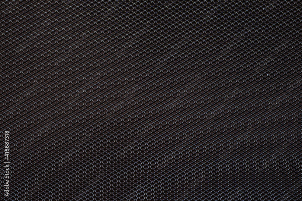 Abstract closeup of metallic background with dark background Abstract closeup of metallic background with dark background
