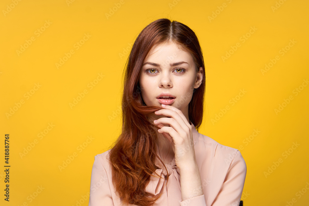 attractive woman holding glamor hair luxury yellow background studio attractive woman holding glamor hair luxury yellow background studio