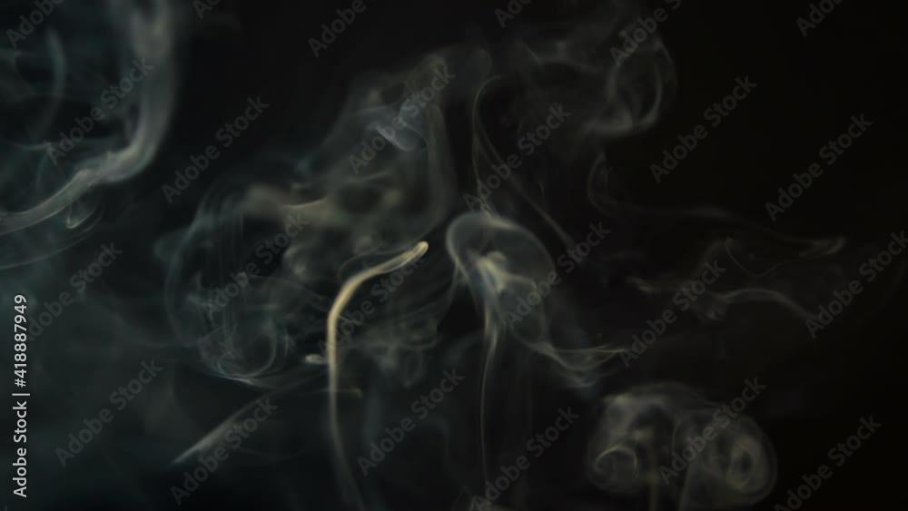 Abstract white smoke. Smoke, a cloud of cold fog on a black background of a fire, a hookah, a fire. Floating fog. Slow motion shooting of 240 Abstract white smoke. Smoke, a cloud of cold fog on a black background of a fire, a hookah, a fire. Floating fog. Slow motion shooting of 240