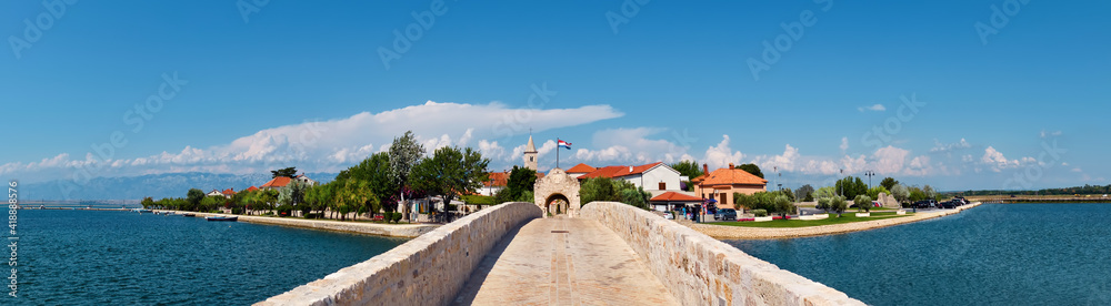 Panoramic image of Nin, historic medieval town in the Zadar County of Croatia. Panoramic image of city center in a lagoon on the eastern shore of the Adriatic Sea.