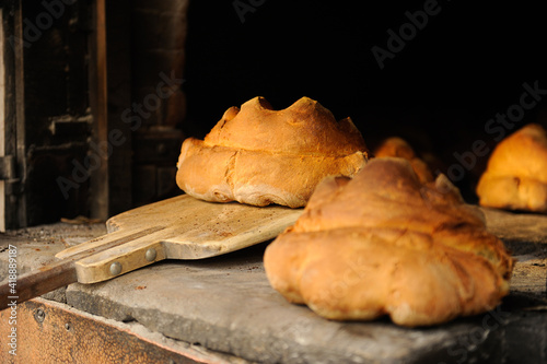 Tableau sur toile The bread of Matera, Pane di Matera, has the shape of a croissant and is produced with the exclusive use of durum wheat semolina
