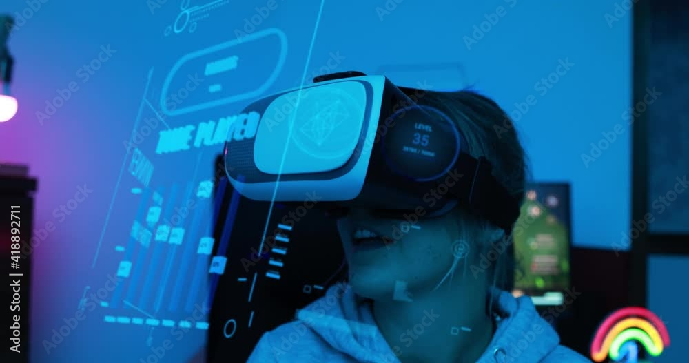 Girl gamer playing at 3D video game using virtual reality headset Girl gamer playing at 3D video game using virtual reality headset
