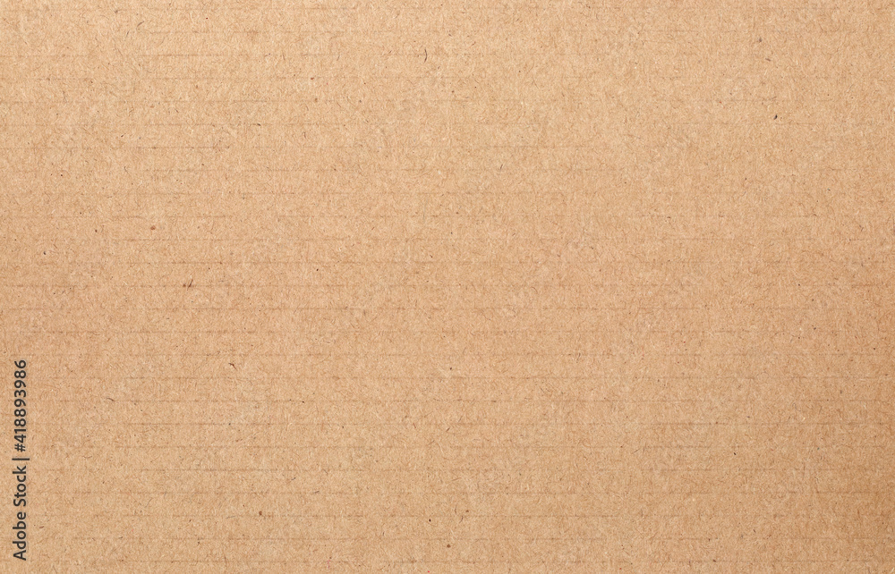 Fototapeta premium Brown cardboard sheet abstract background, texture of recycle paper box in old vintage pattern for design art work.