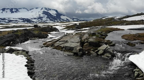 Norway footage. Norway nature - Jotunheimen mountains summer landscape. Sognefjell mountain view. Freshwater stream. photo