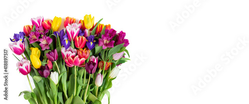 Flower composition. Beautiful colorful spring flowers isolated on a white background. Mothers Day, Womens Day concept. Copy space, top view, flat lay.