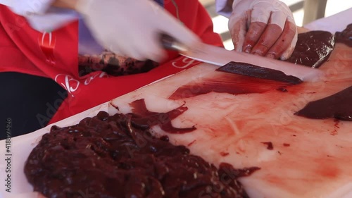 Video of cutting liver with knife. Turkish livers. Turkish ciger photo