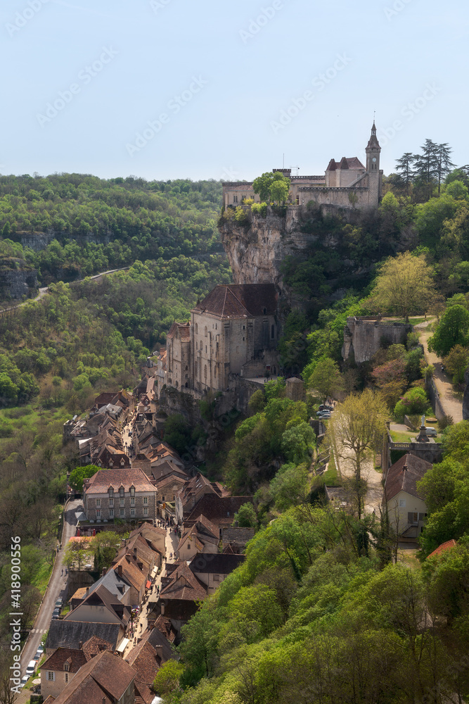 Natural view of a Rocamadour medieval town in France against a clear blue sky background